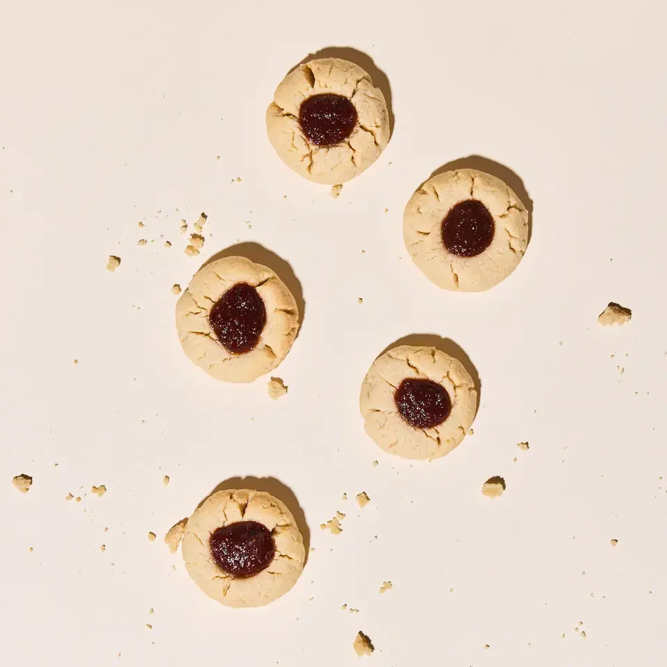 Thumbprint cookies filled with strawberry jalapeño spread