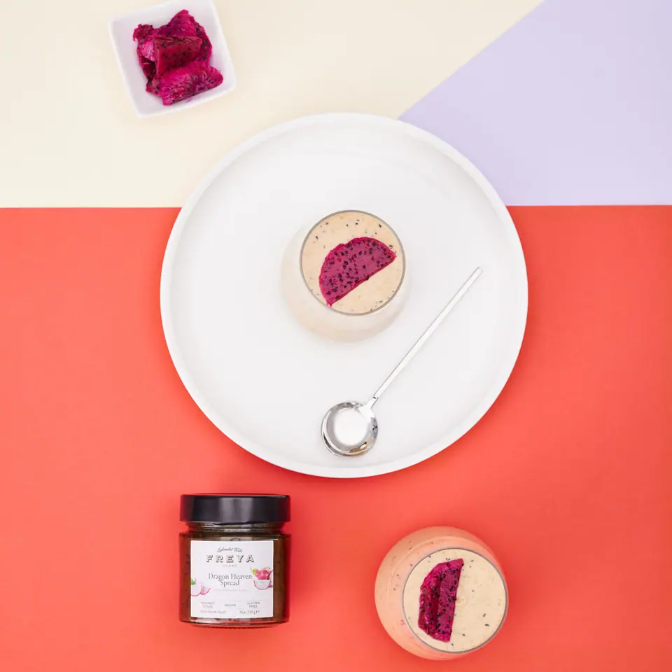 Small dragon fruit mousse desserts with bright pink centers